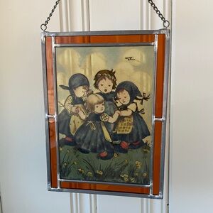 Vintage leaded glass sun catcher of children playing